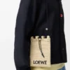 Bolsa com cordão em ráfia Bolsa com cordão em ráfia