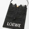 Bolsa com cordão em ráfia Bolsa com cordão em ráfia