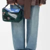 Bolsa «Futurist Cat Small Puzzle» em malha bordada e pele de bezerro clássica Bolsa «Futurist Cat Small Puzzle» em malha bordada e pele de bezerro clássica