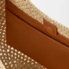 Bolsa Hobo Pequena com Perfurações em Ráfia e Pele de Bezerro Bolsa Hobo Pequena com Perfurações em Ráfia e Pele de Bezerro