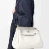 Bolsa Madrid Média em pele de bezerro granulada e flexível Bolsa Madrid Média em pele de bezerro granulada e flexível