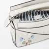 Bolsa Mini Puzzle «Futurist Cat» em pele de bezerro clássica Bolsa Mini Puzzle «Futurist Cat» em pele de bezerro clássica