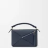 Bolsa pequena «Puzzle» em camadas, em pele de bezerro clássica Bolsa pequena «Puzzle» em camadas, em pele de bezerro clássica