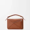 Bolsa pequena «Puzzle» em camadas, em pele de bezerro clássica Bolsa pequena «Puzzle» em camadas, em pele de bezerro clássica