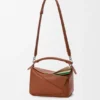 Bolsa pequena «Puzzle» em camadas, em pele de bezerro clássica Bolsa pequena «Puzzle» em camadas, em pele de bezerro clássica