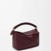 Bolsa Puzzle pequena em pele de bezerro lisa e pele de borrego napa Bolsa Puzzle pequena em pele de bezerro lisa e pele de borrego napa