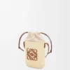 Bolsa quadrada em palha de iraca e pele de bezerro Bolsa quadrada em palha de iraca e pele de bezerro
