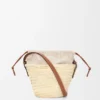 Bolsa tipo balde com cordão em folha de palmeira e pele de bezerro Bolsa tipo balde com cordão em folha de palmeira e pele de bezerro