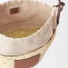 Bolsa tipo balde com cordão em folha de palmeira e pele de bezerro Bolsa tipo balde com cordão em folha de palmeira e pele de bezerro