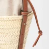 Bolsa tipo balde com cordão em folha de palmeira e pele de bezerro Bolsa tipo balde com cordão em folha de palmeira e pele de bezerro