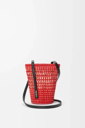 Bolsa trançada em palha de iraca e pele de bezerro