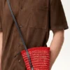 Bolsa trançada em palha de iraca e pele de bezerro Bolsa trançada em palha de iraca e pele de bezerro