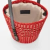 Bolsa trançada em palha de iraca e pele de bezerro Bolsa trançada em palha de iraca e pele de bezerro