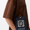 Bolso com cordão em pele de bezerro clássica e ráfia Bolso com cordão em pele de bezerro clássica e ráfia