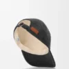 Boné com emblema em lã Boné com emblema em lã
