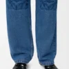 Calças de ganga largas Anagram em denim Calças de ganga largas Anagram em denim