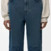 Calças de ganga largas Anagram em denim Calças de ganga largas Anagram em denim