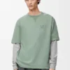 Camisas de corte largo em algodão Camisas de corte largo em algodão