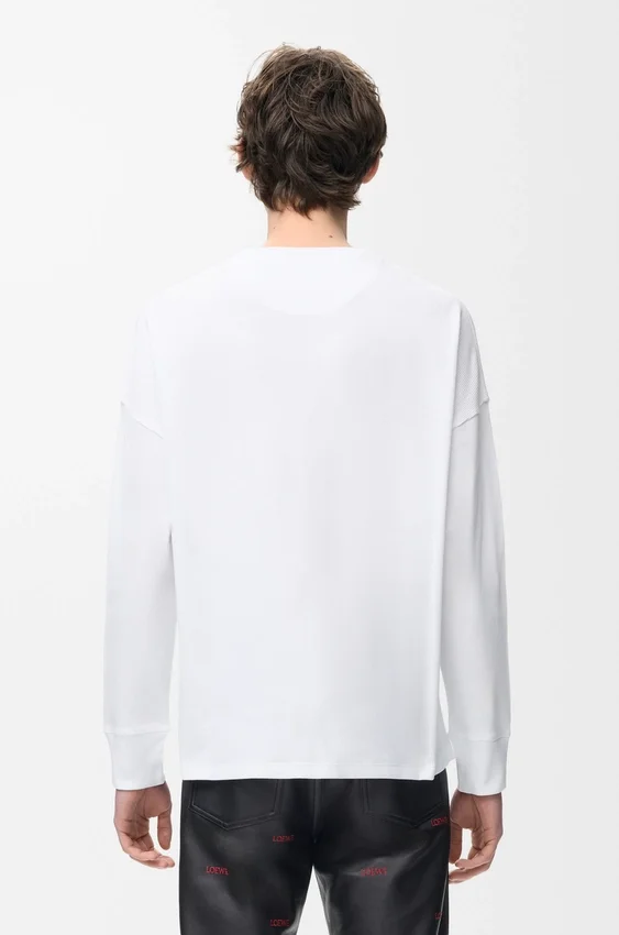 Camisas de manga comprida com corte oversized em algodão Camisas de manga comprida com corte oversized em algodão
