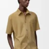 Camisas de manga curta em pele de cabra camurçada Camisas de manga curta em pele de cabra camurçada