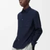 Camisas em algodão