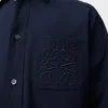 Camisas em algodão