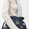 Clutch «Cats» Flamenco em ganga bordada Clutch «Cats» Flamenco em ganga bordada
