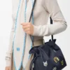 Clutch «Cats» Flamenco em ganga bordada Clutch «Cats» Flamenco em ganga bordada