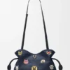 Clutch «Cats» Flamenco em ganga bordada Clutch «Cats» Flamenco em ganga bordada