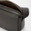 Mala de tiracolo Pebble média em pele de bezerro lisa Mala de tiracolo Pebble média em pele de bezerro lisa