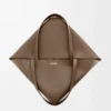 Mala Tote Puzzle Fold XL em pele de bezerro brilhante Mala Tote Puzzle Fold XL em pele de bezerro brilhante