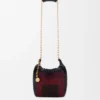 Mini-bolsa «Squeeze» em couro com contas Mini-bolsa «Squeeze» em couro com contas