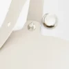 Mini-bolsa tipo Pebble Bucket em pele de bezerro macia com grão Mini-bolsa tipo Pebble Bucket em pele de bezerro macia com grão