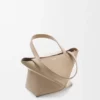 Mini Puzzle Fold Tote em pele de bezerro brilhante Mini Puzzle Fold Tote em pele de bezerro brilhante