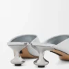 Mule «Toy» em pele de borrego laminada Mule «Toy» em pele de borrego laminada