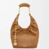 Pequena bolsa «Squeeze» em pele de borrego napa suave Pequena bolsa «Squeeze» em pele de borrego napa suave