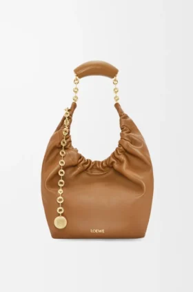 Pequena bolsa «Squeeze» em pele de borrego napa suave