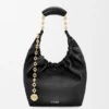 Pequena bolsa «Squeeze» em pele de borrego napa suave Pequena bolsa «Squeeze» em pele de borrego napa suave
