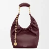 Pequena bolsa «Squeeze» em pele de borrego napa suave Pequena bolsa «Squeeze» em pele de borrego napa suave