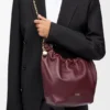 Pequena bolsa «Squeeze» em pele de borrego napa suave Pequena bolsa «Squeeze» em pele de borrego napa suave