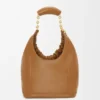 Pequena bolsa «Squeeze» em pele de borrego napa suave Pequena bolsa «Squeeze» em pele de borrego napa suave