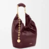 Pequena bolsa «Squeeze» em pele de borrego napa suave Pequena bolsa «Squeeze» em pele de borrego napa suave