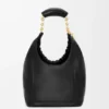 Pequena bolsa «Squeeze» em pele de borrego napa suave Pequena bolsa «Squeeze» em pele de borrego napa suave