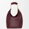 Pequena bolsa «Squeeze» em pele de borrego napa suave Pequena bolsa «Squeeze» em pele de borrego napa suave