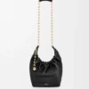 Pequena bolsa «Squeeze» em pele de borrego napa suave Pequena bolsa «Squeeze» em pele de borrego napa suave