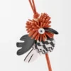 Pingente de poupa em pele de bezerro clássica Pingente de poupa em pele de bezerro clássica