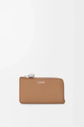 Porta-moedas «Pebble» em pele de bezerro com grão «Pebble»