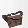 Puzzle Bumbag pequena em pele de bezerro granulada Puzzle Bumbag pequena em pele de bezerro granulada