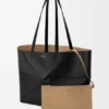 Saco Tote Médio Horizontal com Puzzle Fold em Pele de Bezerro de Grão Suave Saco Tote Médio Horizontal com Puzzle Fold em Pele de Bezerro de Grão Suave