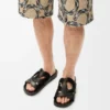 Sandália Ease Monogram em pele de bezerro curtida vegetalmente Sandália Ease Monogram em pele de bezerro curtida vegetalmente